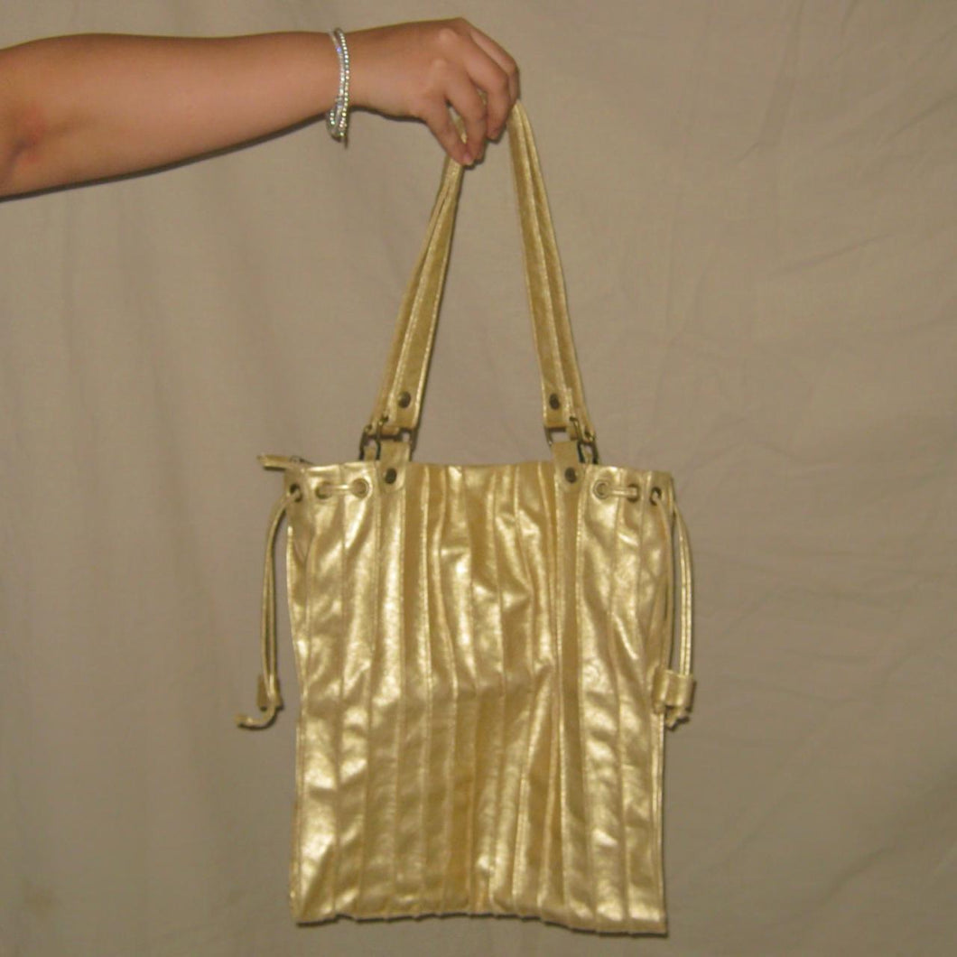 Muaziz S.L gold shimmer shoulder bag